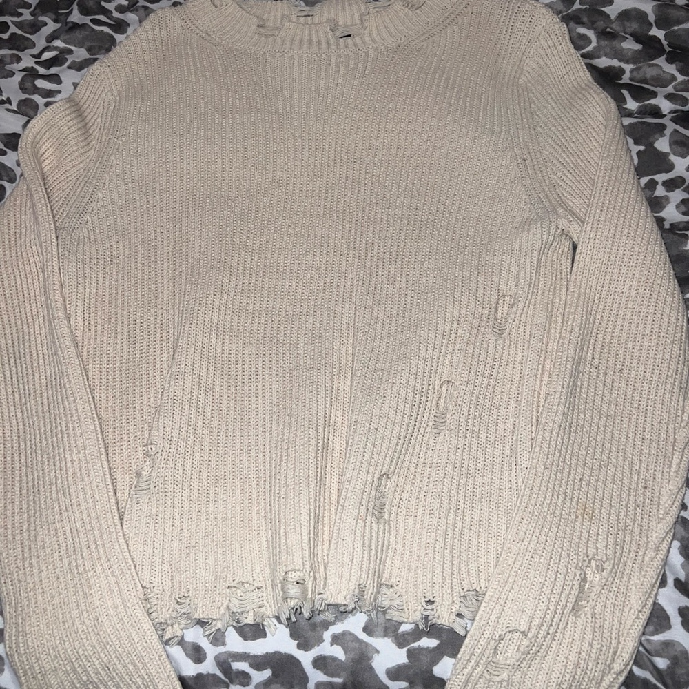 Distressed sweater